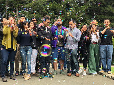 residents blowing bubbles
